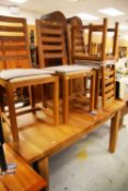 MODERN OAK EXTENDING DINING TABLE with four matching chairs