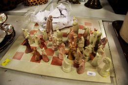 TWO SMOLART HANDMADE SOAPSTONE CHESS SETS in animal form