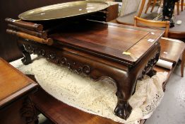 A BRASS BENARES PERSIAN FOLDING TEA TABLE and a Chinese hardwood altar-type table