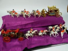 TWO SETS OF BRITAIN'S ROYAL CARRIAGE PROCESSIONS lead figure models, presented in a wooden and glass