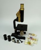 A PHILIP HARRIS OF BIRMINGHAM VINTAGE MICROSCOPE with brass adjustment and lens, TOGETHER WITH tin