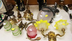 THREE BRASS TABLE LAMPS, a brass mounted tinted glass twin-sconce wall mounted light fitting, a