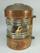 AN AHLEMANN SCHLATTER of BREMEN COPPER SHIP'S LAMP of curved form No P6197 38cms high