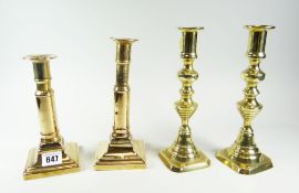 PAIR OF BRASS SQUARE BASED VICTORIAN CANDLESTICKS and another pair