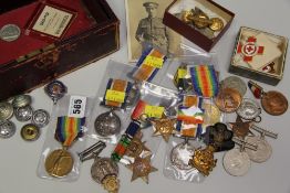 ANTIQUE LEATHER DOME TOP JEWELLERY BOX containing assorted medals to include WWI predominantly, some