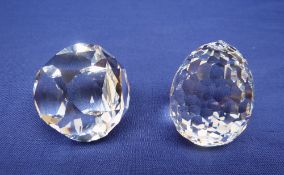 A SWAROVSKI EGG AND GEOMETRIC PAPERWEIGHT (both boxed)