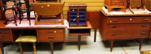 A FIVE PIECE MID CENTURY BEDROOM SUITE BY YOUNGER comprising long dressing table, bed ends