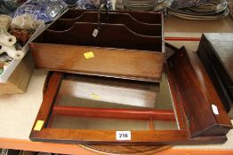 THREE WOODEN ANTIQUES comprising a deep three-section cutlery basket with brass handle, a hanging