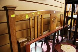 A PAIR OF ENGLISH OAK CARVED BED ENDS