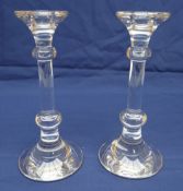 A PAIR OF VAL ST LAMBERT CRYSTAL GLASS CANDLEHOLDERS of circular base form and with knopped stems,