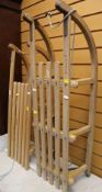 TWO VINTAGE WOODEN SLATTED SLEDGES