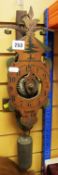 A REPRODUCTION ANTIQUE BLACK FOREST STYLE SKELETON WALL CLOCK
