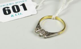 18 CARAT YELLOW GOLD THREE STONE DIAMOND RING 2.2 grams approx.