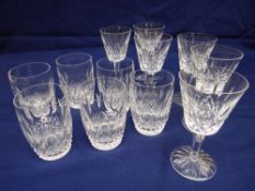 TWELVE WATERFORD CUT GLASS DRINKING GLASSES