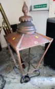 AN ANTIQUE METALWORK STREET LANTERN ENCASEMENT with circular finial