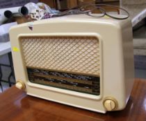 A CREAM COLOURED COSSOR VINTAGE VALVE RADIO