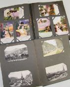 TWO VINTAGE POSTCARD ALBUMS, one with personalisation dated 1918 containing topographical birthday