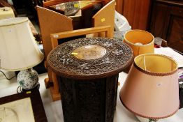 A FOLDING CARVED ISLAMIC TYPE TEATABLE, two toilet mirrors and three table lamps