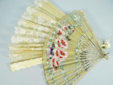 A FINE CARVED IVORY (BELIEVED) AND LACE FAN, TOGETHER WITH another fan inscribed 'Winter and