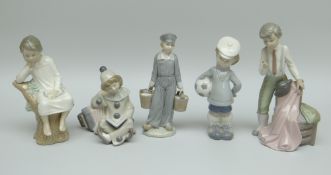 A GROUP OF FIVE LLADRO PORCELAIN SCULPTURES comprising child with football, seated child in