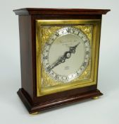 A NEAT ELLIOT OF LONDON MANTEL CLOCK inscribed 'Garrard & Co. Ltd London' to the silvered dial 14cms