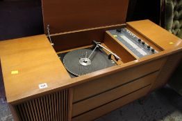 A GRAMOPHONE / BUSH TEAK ENCASED RADIOGRAM