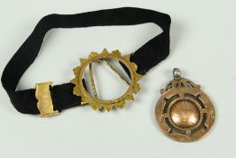 SILVER SPORTING PENDANT engraved 'Craig a Don FC Winners' 31/32, together with 9 carat gold set