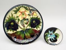 A MOORCROFT POTTERY DISPLAY DISH in the 'Hellebore' pattern model no. 78310 designed by Nicola
