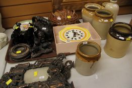 A PAIR OF ORNAMENTAL METALLIC EASEL FRAMES, a china-plate novelty clock, pair of black lustre cow