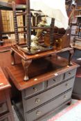 A STAG CHEST OF TWO LONG & THREE SHORT DRAWERS together with an overbed tray, a stationary rack