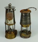 TWO ANTIQUE MINERS LAMPS one being a model by The Wolf Safety Lamp Company and inscribed