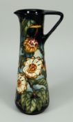 A MOORCROFT POTTERY SLENDER TAPERED JUG limited edition (294/400) unknown pattern signed K