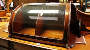 A HALF-MOON GLAZED HANGING CORNER CABINET