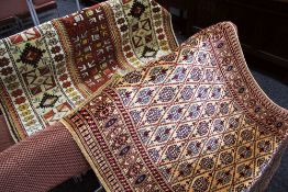 TWO PERSIAN CARPETS with intricate blue ground floral medallion design