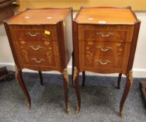 A PAIR OF FRENCH-STYLE REPRODUCTION BEDSIDE CABINETS of small proportions, having three drawers