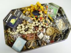 COSTUME JEWELLERY a tin-full and including wristwatches, bar brooches, beads, earrings, retro