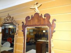 ANTIQUE CARVED FRAME WALL MIRROR having gilded floral decoration, gilded slip and gilded ho-ho