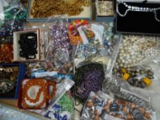 FRUIT BOX CONTAINING LARGE QUANTITY OF COSTUME NECKLACES with some cases, mostly modern