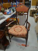 STUDDED & UPHOLSTERED ELBOW CHAIR of nice shapely form