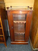 VINTAGE SINGLE DOOR MAHOGANY MUSIC CABINET having a rail top, 50cms wide