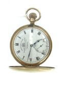 VICTORIAN 9CT YELLOW GOLD HALF-HUNTER POCKET WATCH having a white enameled dial bearing Roman