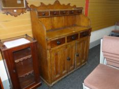 FRENCH 19TH CENTURY STAINED PINE DRESSER, the cupboard base with twin paneled doors, three middle