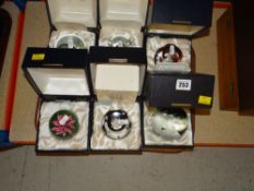 SIX CASED CAITHNESS PAPERWEIGHTS and an Orient Flume similar