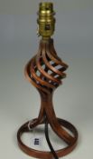 ROBERT WELCH ATTRIBUTED COPPER LAMP BASE of circular form and with swirl basket body, 28cms high