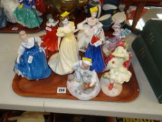 ELEVEN ROYAL DOULTON PORCELAIN FIGURINES including 'Childhood memories - Caught One', and 'Childhood