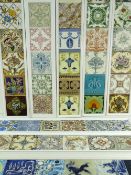 EIGHT FRAMED VERTICAL DISPLAYS OF EARTHENWARE TILES mainly floral and including an Islamic type
