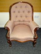 VICTORIAN FRAMED BUTTON BACK SPOON SHAPED CHAIR of serpentine and carved form in pink floral tiled