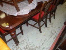 ANTIQUE MAHOGANY DINING TABLE on reeded tapered supports and castors, together with 6+2 reproduction