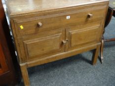BRYNMAWR SIDEBOARD in oak with two cupboards and single long drawer, (one handle retained by us),