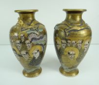 PAIR OF SATSUMA 'THOUSAND FACES' BALUSTER VASES having circling dragon to the neck and with